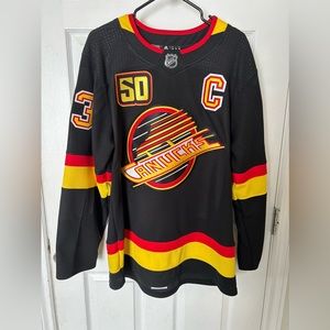 Authentic Adidas Vancouver Canucks Jersey, 50th anniversary, skate logo. Horvat